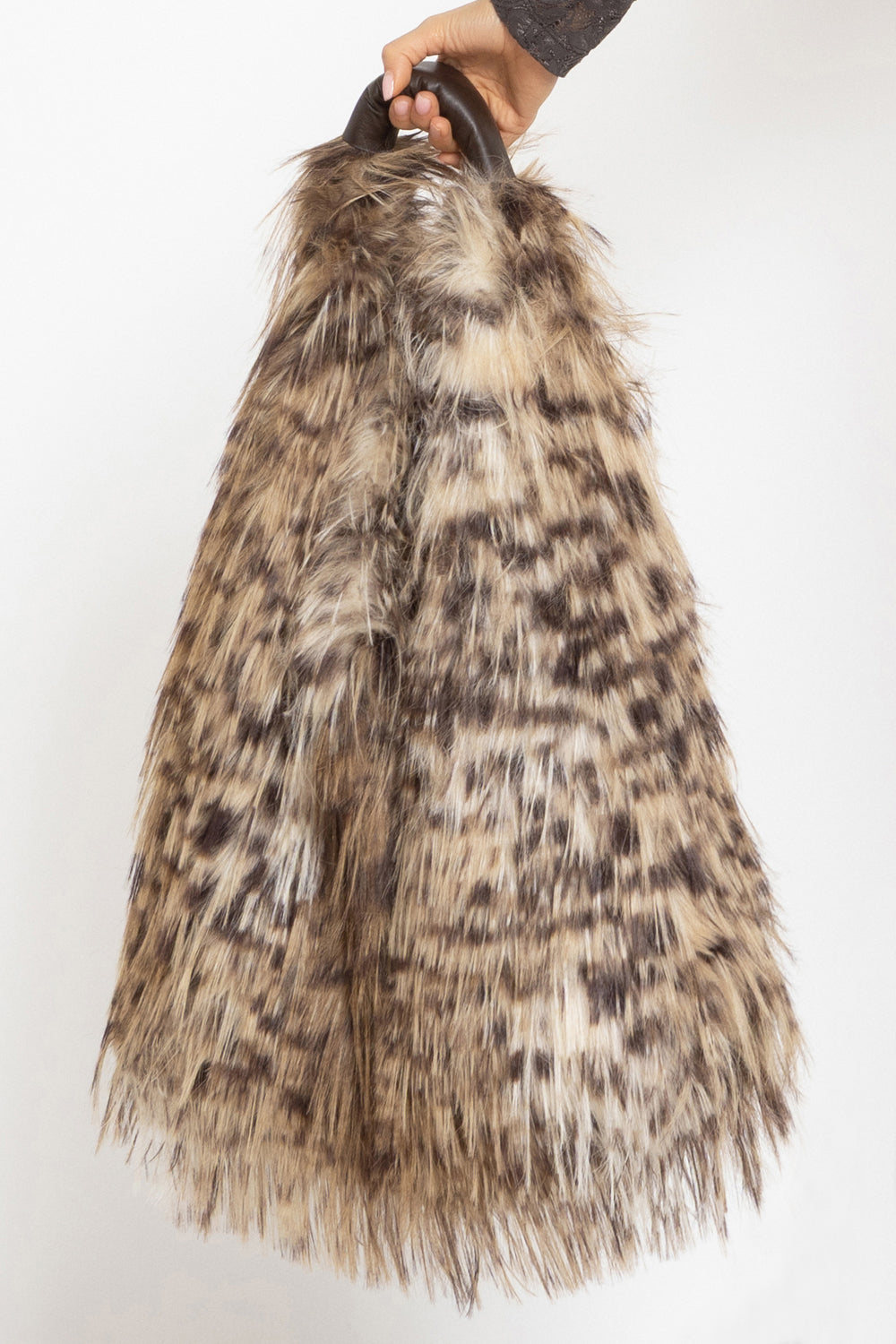 REVERSIBLE SERVAL FAUX FUR AND  LEATHER BAG - ESSENTIALS
