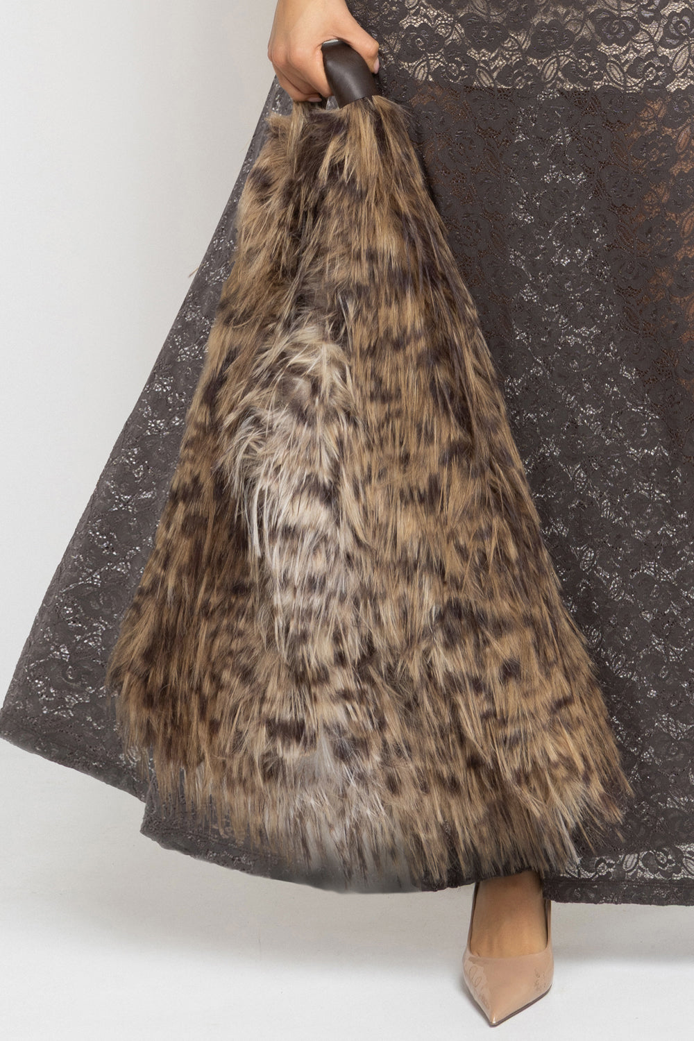 REVERSIBLE SERVAL FAUX FUR AND  LEATHER BAG - ESSENTIALS