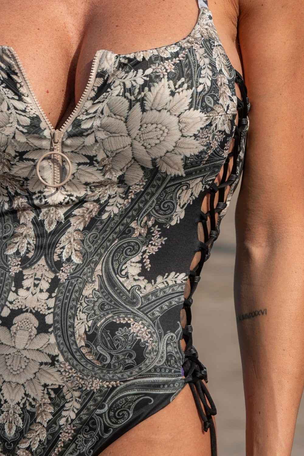 ONE-PIECE SWIMSUIT WITH ZIP AND SIDE TIES – FROZEN LOTUS - Fashion Roots
