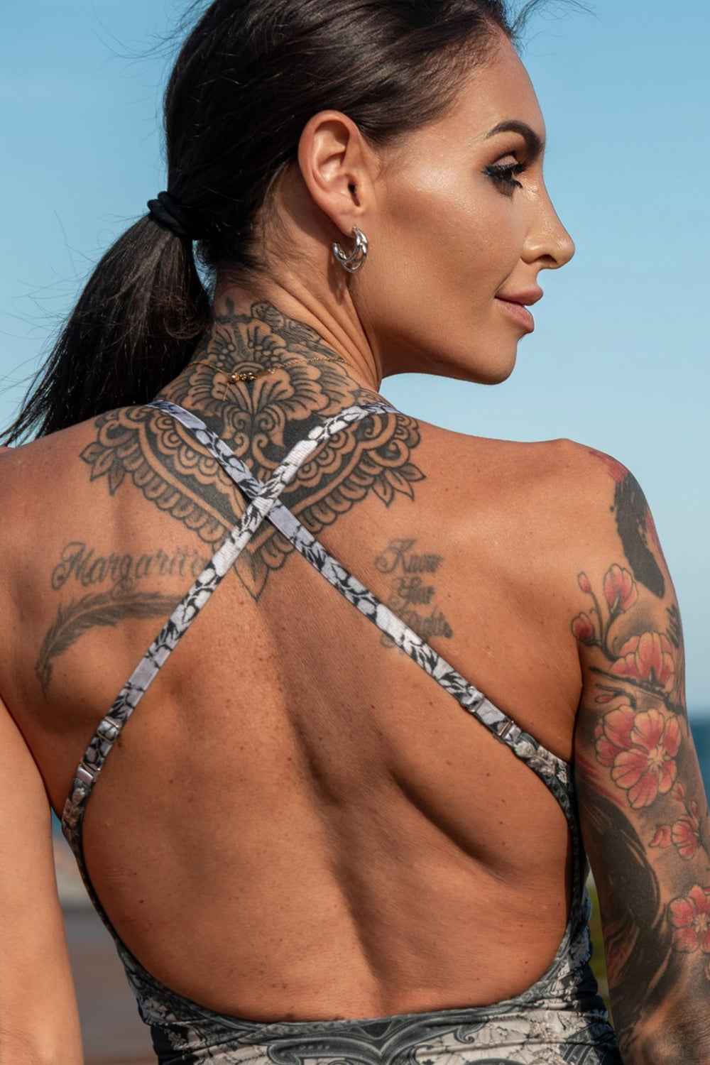 ONE-PIECE SWIMSUIT WITH ZIP AND SIDE TIES – FROZEN LOTUS - Fashion Roots